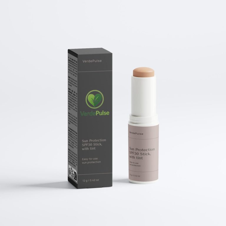A skincare stick in a box, featuring a green logo and a neutral shade.